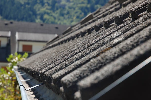 Durable Tiled Roof with Efficient Metal Gutter System for Water Drainage